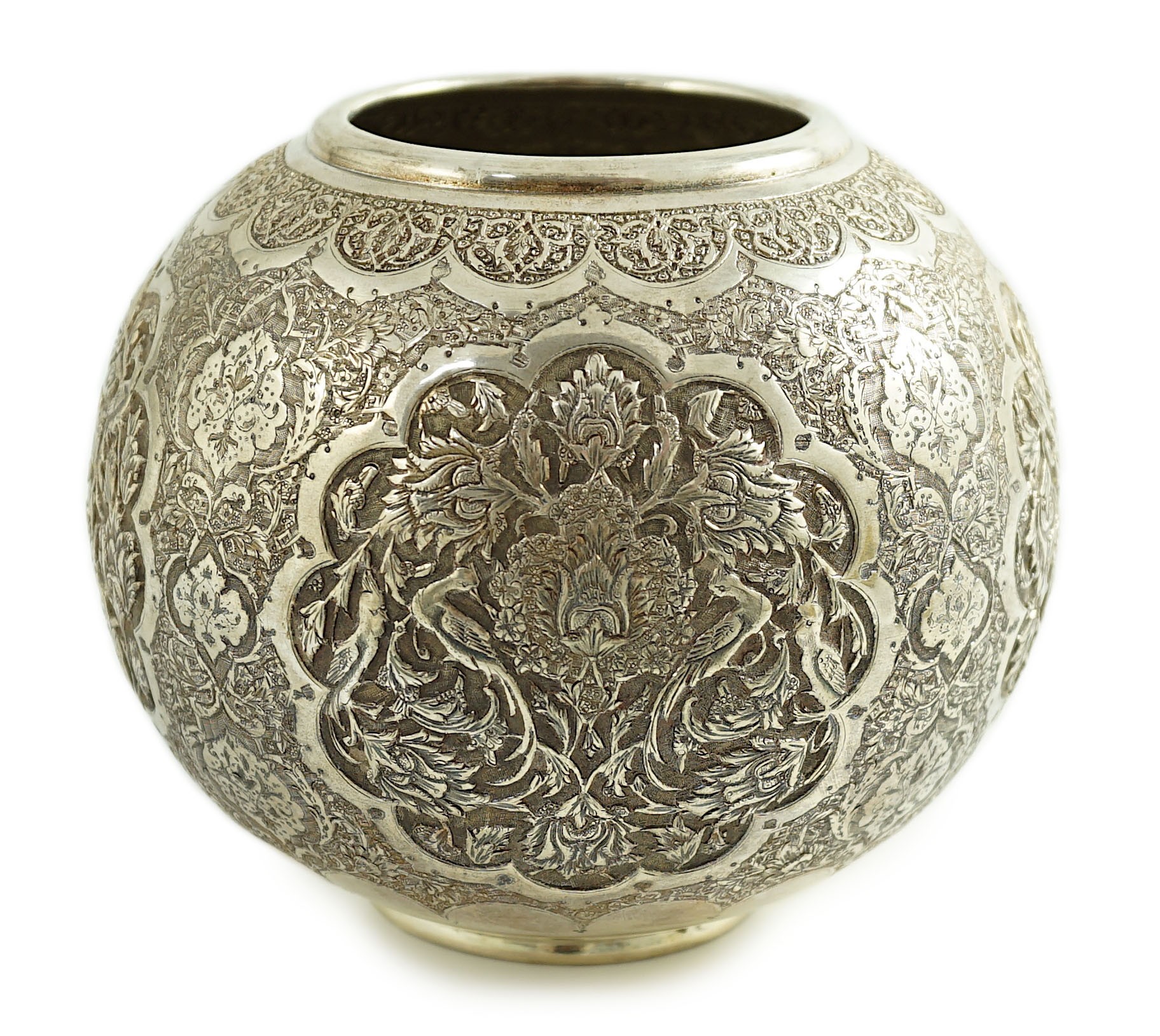 A 20th century Persian 84 standard embossed and engraved white metal vase, height 14cm, 17.4oz.